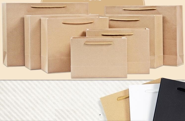 De in het groot de Giftzak van Tote Carrier Shopping Packaging Paper van de Luxe Met de hand gemaakte Creatieve Elegante Douane, embleem drukte bruine pape
